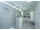 Beautiful spa-like main bathroom with soaking tub, shower and neutral color palette at 1089 Fort Johnson Rd, Charleston, SC 29412