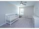 Bright Bedroom with a white crib, dresser, and neutral décor, perfect for a peaceful sleep at 1089 Fort Johnson Rd, Charleston, SC 29412