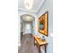 Elegant entryway showcasing hardwood floors, decorative mirror, and stylish furnishings at 1089 Fort Johnson Rd, Charleston, SC 29412