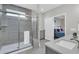 Modern bathroom featuring a glass-enclosed shower, gray tile and a convenient entrance to the bedroom at 116 Ivy Terrace Rd, Summerville, SC 29486