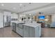 Open concept kitchen with stainless steel appliances flows into the living area for easy entertaining at 116 Ivy Terrace Rd, Summerville, SC 29486