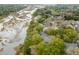 Scenic aerial shot of waterfront apartments surrounded by mature trees and marsh views at 1174 Village Creek Ln # 3, Mount Pleasant, SC 29464