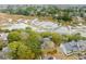 Stunning aerial view of the property featuring lush greenery, marsh views, and parking areas at 1174 Village Creek Ln # 3, Mount Pleasant, SC 29464