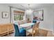 Charming dining area features stylish lighting, comfortable seating, and decor for Gathering meals at 1174 Village Creek Ln # 3, Mount Pleasant, SC 29464