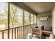 Inviting screened porch with comfortable seating, perfect for relaxation and enjoying the outdoors at 1174 Village Creek Ln # 3, Mount Pleasant, SC 29464