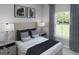 Cozy bedroom featuring natural light, neutral decor, and furnishings perfect for relaxation and rest at 118 Threaded Fern St, Summerville, SC 29485