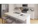 Modern kitchen featuring stainless steel appliances, a breakfast bar, and ample counter space for culinary enthusiasts at 118 Threaded Fern St, Summerville, SC 29485