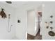 Bright bathroom with a niche for toiletries and a shower head with wood accent at 12 Poplar St, Charleston, SC 29403