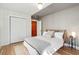Comfortable bedroom with a queen size bed, closet and hardwood floors at 12 Poplar St, Charleston, SC 29403