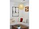 Intimate living room featuring modern art, comfortable seating and stylish lighting at 12 Poplar St, Charleston, SC 29403