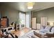 Cozy living room with dark green walls, hardwood floors, and a neutral sofa at 12 Poplar St, Charleston, SC 29403