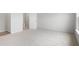 Bright bedroom features neutral carpet and an open doorway leading to the bathroom at 121 Moscato Ln, Summerville, SC 29485