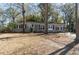 Charming brick home with well-maintained landscaping and mature trees at 1239 Wappetaw Pl, Mount Pleasant, SC 29464