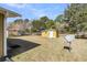 A well-manicured backyard with an outbuilding providing ample space for outdoor activities at 1442 N Sherwood Drive Dr, Charleston, SC 29407