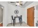 Bright eat-in kitchen with neutral walls, a ceiling fan, a table with chairs, and tile floors at 1442 N Sherwood Drive Dr, Charleston, SC 29407