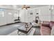Cozy living room featuring a ceiling fan, a coffee table and an armchair at 1442 N Sherwood Drive Dr, Charleston, SC 29407