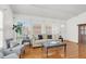 Cozy living room featuring hardwood floors and an entryway at 1442 N Sherwood Drive Dr, Charleston, SC 29407