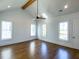 Bright bedroom with wood floors, ceiling fan, and a vaulted ceiling at 1468 Alligator Creek Ct, Awendaw, SC 29429
