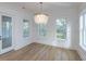 Cozy living area with natural light and modern ceiling light at 1468 Alligator Creek Ct, Awendaw, SC 29429
