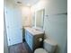 Bathroom with double sinks, gray cabinets, and toilet at 157 Spencer Circle Cir, Summerville, SC 29485