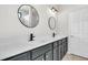 Contemporary bathroom with dual sinks and a minimalist design, showcasing clean lines at 174 Sea Lavender Ln, Summerville, SC 29486