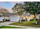 Beautiful single-Gathering house offers a two-car garage, manicured lawn, and welcoming front entrance at 174 Sea Lavender Ln, Summerville, SC 29486