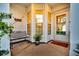 Cozy porch with a bench, potted plant, and decor creating a welcoming entrance to the home at 174 Sea Lavender Ln, Summerville, SC 29486