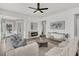Bright and inviting living room with modern fireplace and stylish furnishings, perfect for relaxation and entertaining at 174 Sea Lavender Ln, Summerville, SC 29486