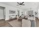 Spacious living room with an open floor plan and stylish decor seamlessly connecting living spaces at 174 Sea Lavender Ln, Summerville, SC 29486