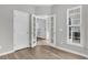 Bright office with French doors, a large window for natural light, and modern flooring at 174 Sea Lavender Ln, Summerville, SC 29486