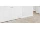 Neutral carpeted bedroom showing closet doors at 201 Seele St, Lincolnville, SC 29485