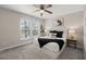 Comfortable bedroom featuring a plush bed with a decorative throw blanket and neutral decor at 2028 Wild Flower Lane, Charleston, SC 29414