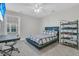 Bedroom featuring a plaid bedspread, car collection, and neutral walls at 207 Calm Water Way, Summerville, SC 29486