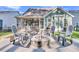 Backyard featuring a stylish fire pit and ample seating, ideal for entertaining and enjoying the outdoors at 207 Calm Water Way, Summerville, SC 29486