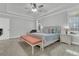 Spacious main bedroom featuring a tray ceiling and soft, inviting decor with carpet floor at 207 Calm Water Way, Summerville, SC 29486