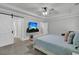 Main bedroom with sleek TV, en-suite bath access, and a calm, neutral color palette at 207 Calm Water Way, Summerville, SC 29486