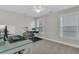 Bright office space with a desk, drum set, and natural light at 207 Calm Water Way, Summerville, SC 29486