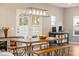 Dining area with a view of the outdoor space and backyard through large sliding doors at 217 Lucca Dr, Summerville, SC 29486