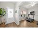 Bright entryway with a view of the home gym; natural light; wood-look floors at 217 Lucca Dr, Summerville, SC 29486