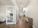 Hallway view with home office, storage, and wood floors at 217 Lucca Dr, Summerville, SC 29486