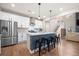 Well-equipped kitchen featuring a large island, stainless steel appliances, and bright white cabinetry at 217 Lucca Dr, Summerville, SC 29486