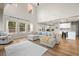 Spacious living room with views of the kitchen, dining area, and backyard at 217 Lucca Dr, Summerville, SC 29486