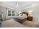 Bedroom with a tray ceiling, and large windows at 217 Lucca Dr, Summerville, SC 29486
