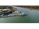 Scenic aerial view of a waterway with boats docked, showcasing waterfront living and recreational opportunities at 24 Commons Ct, Isle of Palms, SC 29451