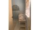 Well-lit bathroom featuring vanity with sink and white wicker storage bench for towels at 24 Commons Ct, Isle of Palms, SC 29451