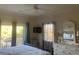 Inviting bedroom features a walkout balcony and sunny views at 24 Commons Ct, Isle of Palms, SC 29451