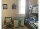 Light-filled bedroom with a bunk bed, side table, and coastal-themed decor adding charm at 24 Commons Ct, Isle of Palms, SC 29451