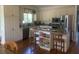 Charming kitchen boasts granite countertops, stainless steel appliances, and a functional island at 24 Commons Ct, Isle of Palms, SC 29451