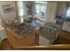 Bright and open kitchen and dining area with hardwood floors and natural lighting at 24 Commons Ct, Isle of Palms, SC 29451