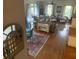A spacious living room with stylish decor, comfortable seating, and abundant natural light, creating an inviting atmosphere at 24 Commons Ct, Isle of Palms, SC 29451